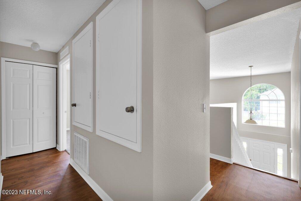 12070 Chester Creek Road Jacksonville, FL 32218 - Photo 25 of 45 a view of an entryway with wooden floor