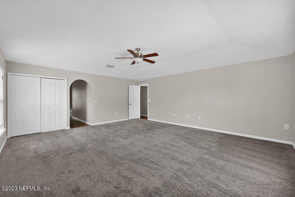 12070 Chester Creek Road Jacksonville, FL 32218 - Photo 29 of 45 a view of empty room with ceiling fan