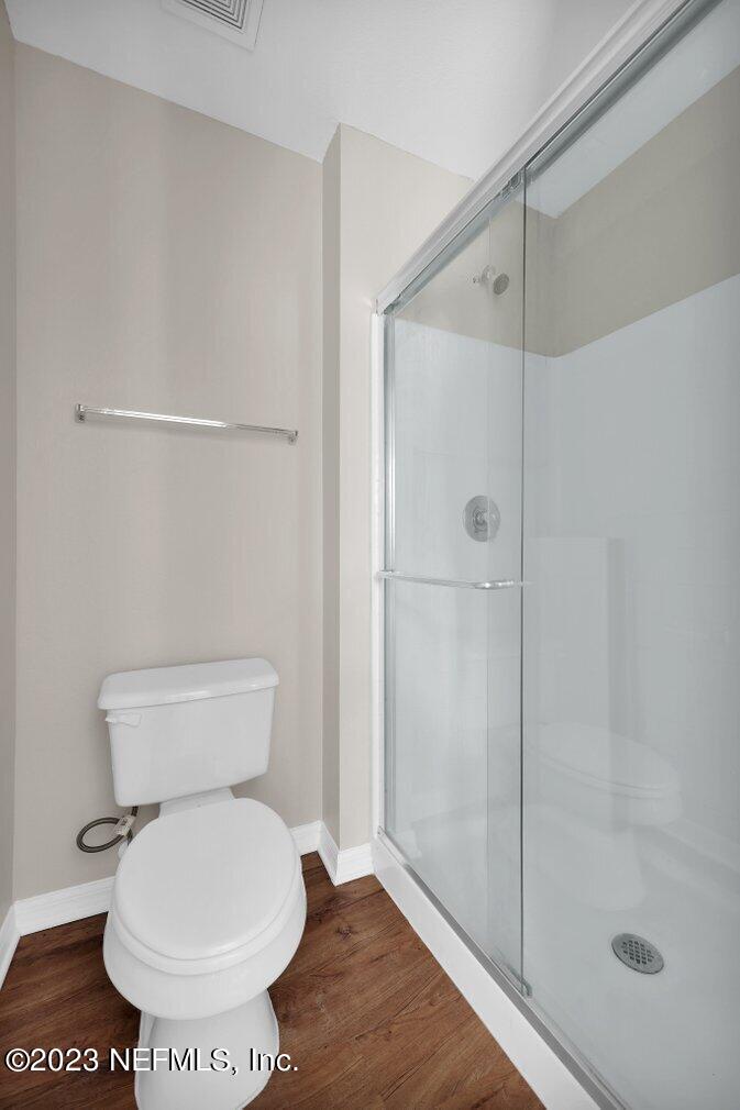 12070 Chester Creek Road Jacksonville, FL 32218 - Photo 32 of 45 a bathroom with a toilet and a shower