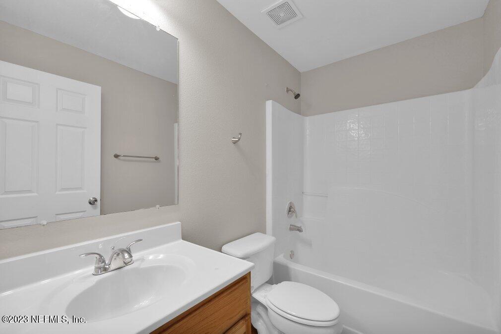 12070 Chester Creek Road Jacksonville, FL 32218 - Photo 37 of 45 a bathroom with a sink toilet and shower