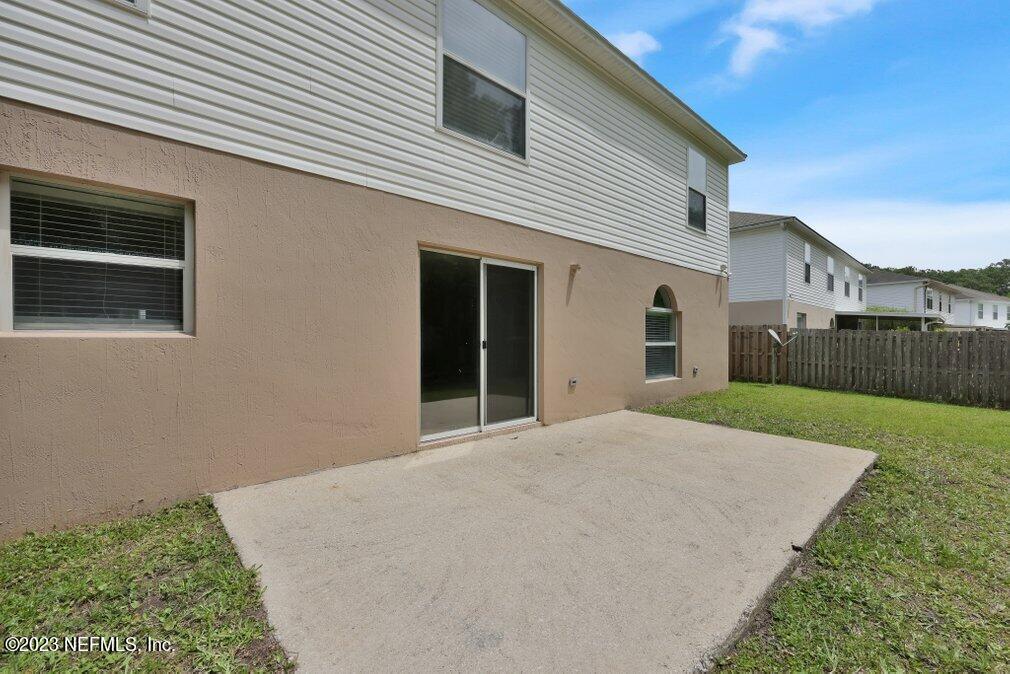 12070 Chester Creek Road Jacksonville, FL 32218 - Photo 41 of 45 a view of an house with backyard and garden