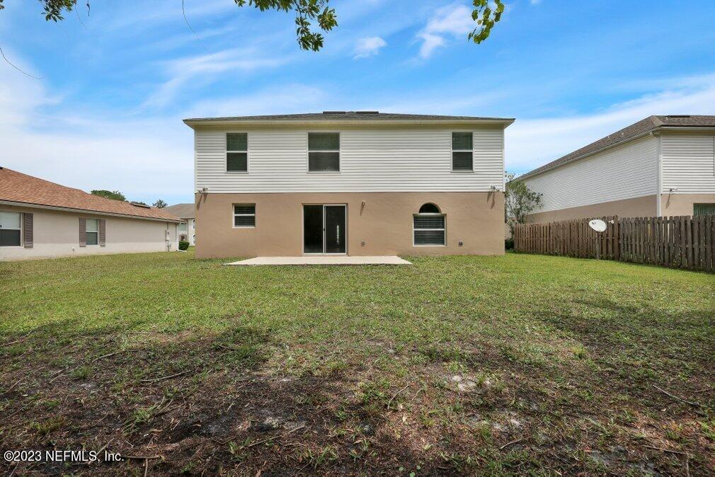 12070 Chester Creek Road Jacksonville, FL 32218 - Photo 44 of 45 a front view of house with yard