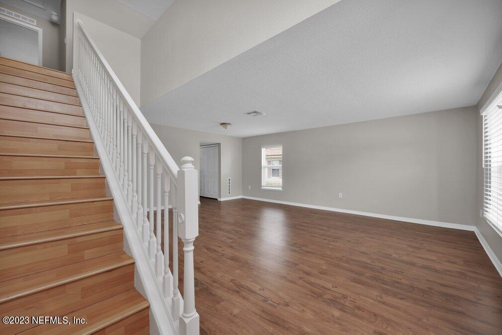 12070 Chester Creek Road Jacksonville, FL 32218 - Photo 7 of 45 a view of entryway with wooden floor