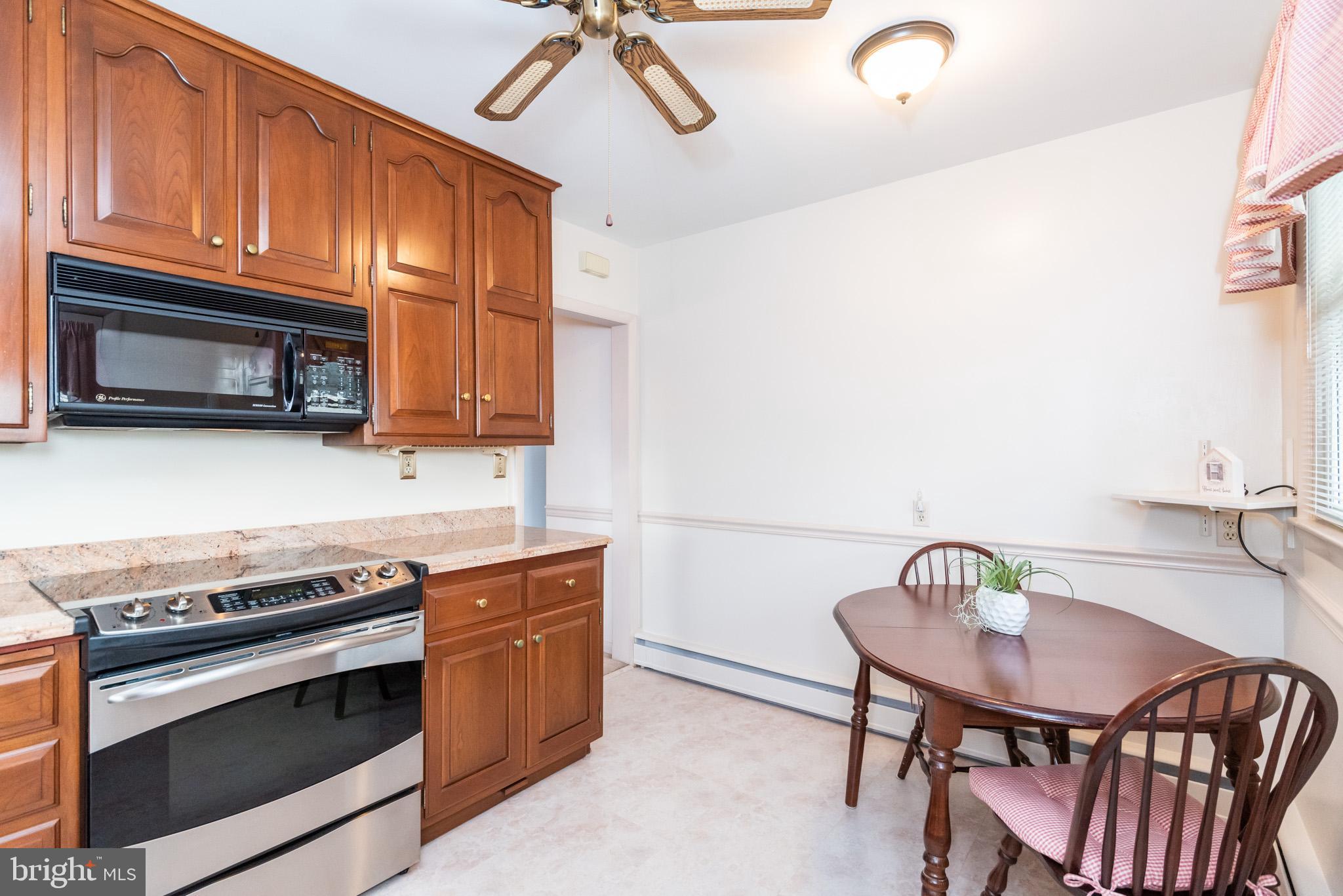 2405 Harwood Road Baltimore, MD 21234 - Photo 11 of 34 EAT-IN KITCHEN/GRANITE/SS APPLIANCES