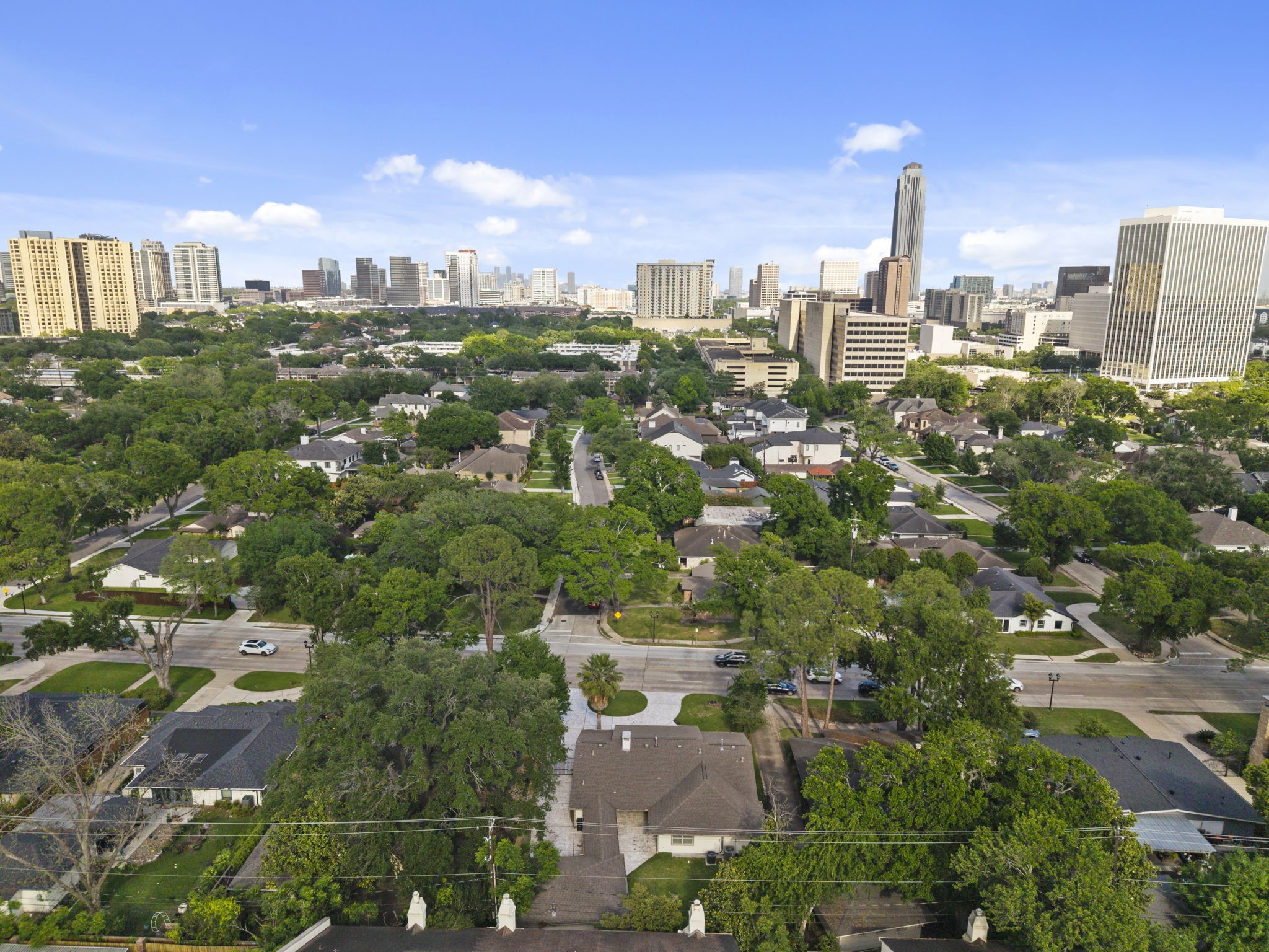 2402 Chimney Rock Road Houston, TX 77057 - Photo 35 of 36 Aerial view showcasing the property’s location within a well-established neighborhood, surrounded by mature trees, nearby parks, and close proximity to the city.