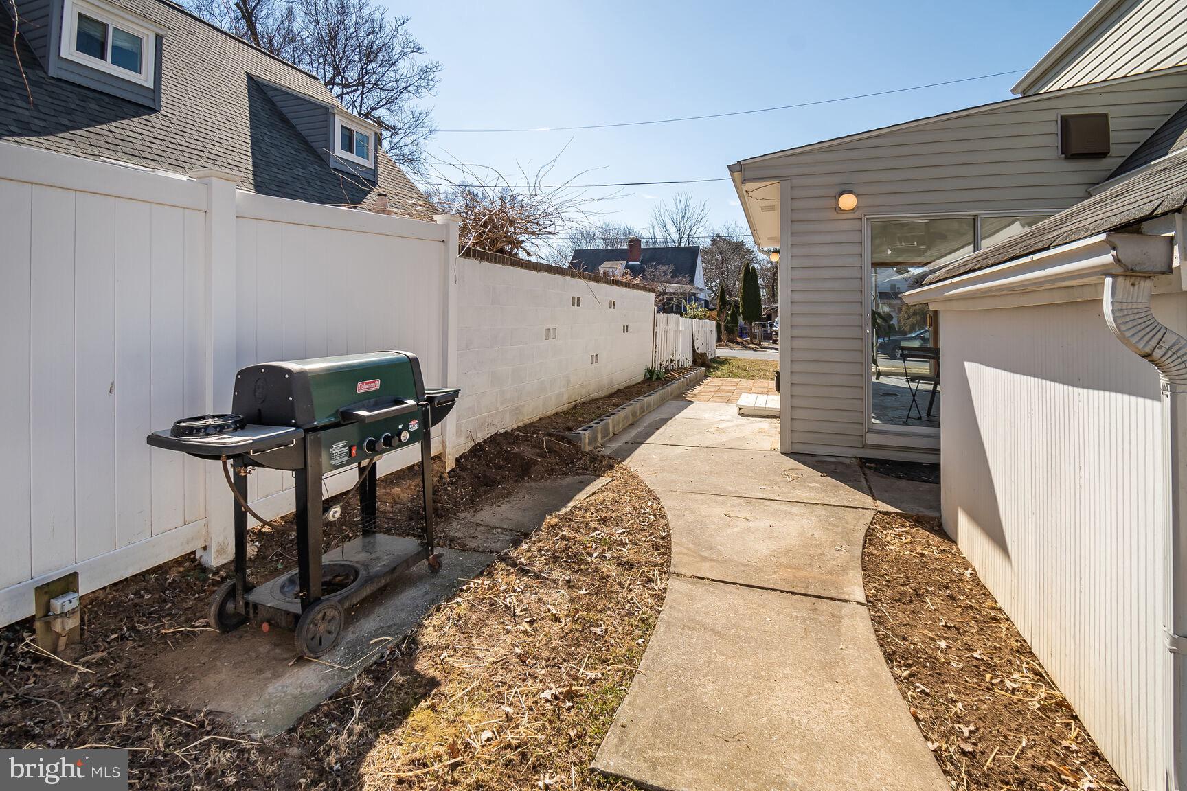 12917 Estelle Road Silver Spring, MD 20906 - Photo 26 of 28 a picture of a table and chairs in terrace