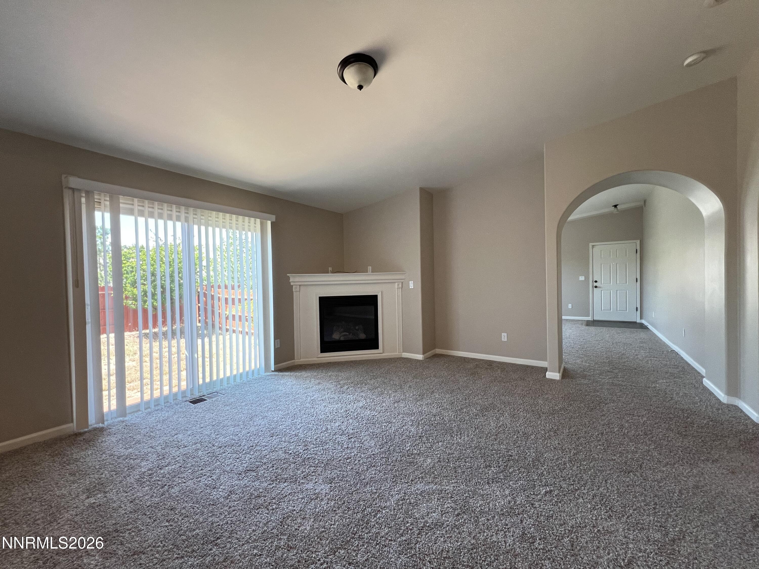 18406 Teddy Bear Court Reno, NV 89508 - Photo 6 of 44 an empty room with windows