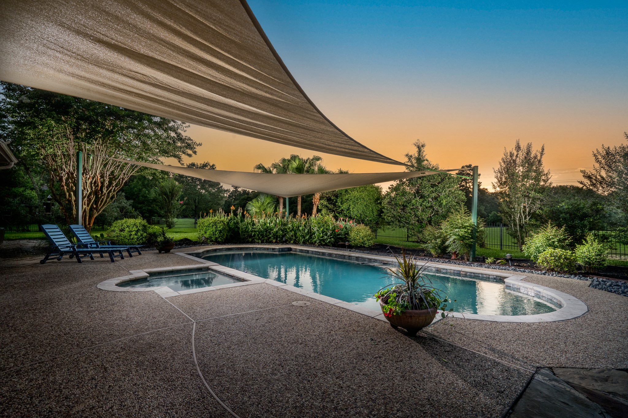 5914 Oakmoss Trail Spring, TX 77379 - Photo 2 of 50 Nighttime will be your favorite time to sit and relax and enjoy a cool beverage on a warm summers night looking up at the night art!