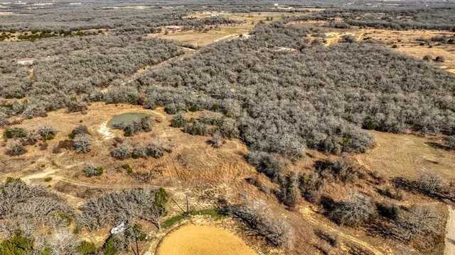 a view of a yard covered with snow