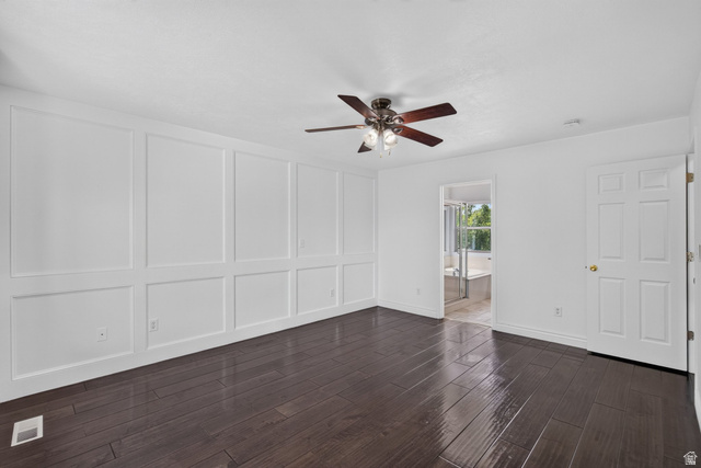 2223 North Pointe Meadow Loop Lehi, UT 84048 - Photo 21 of 56 Spacious room featuring dark wood-finish flooring and extensive wall paneling