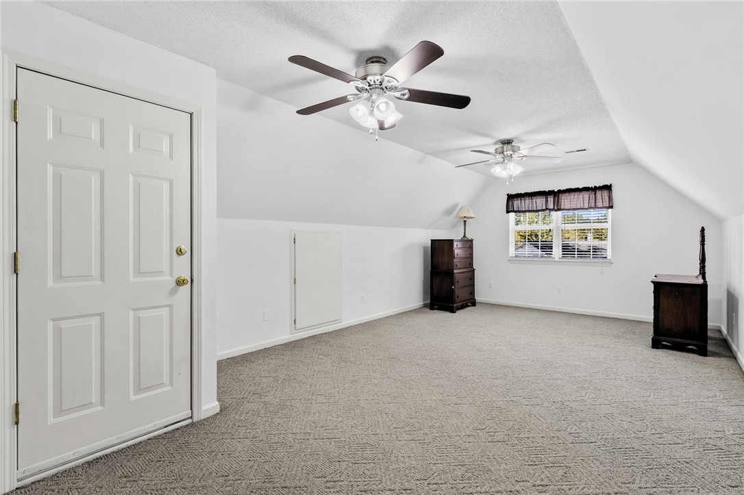 608 Robin Hood Lane Anderson, SC 29621 - Photo 35 of 36 Slanted ceilings and soft carpeting define this versatile upper-level space.