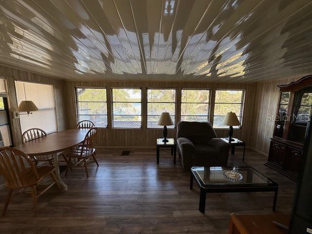 9486 Gray Fox Drive Weeki Wachee, FL 34613 - Photo 8 of 43 a living room with furniture and wooden floor