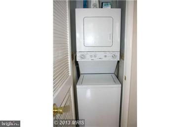 1800 R Street Northwest, Unit 604 Washington, DC 20009 - Photo 17 of 17 Compact laundry solution in a closet.