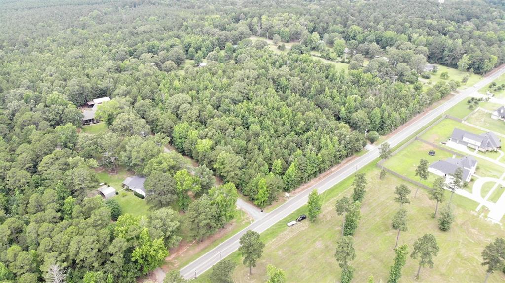 0 Crouch Road, Unit 2 Benton, LA 71006 - Photo 2 of 7 Expansive wooded acreage featuring mature trees and a paved road frontage