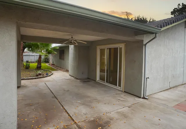 a view of a house with porch and wooden floor