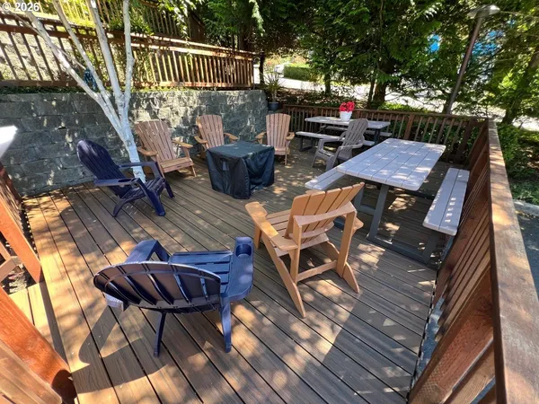 a view of an outdoor sitting area with furniture
