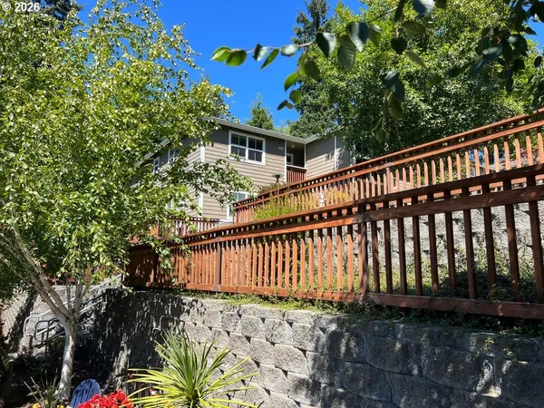 a view of a house with a small yard