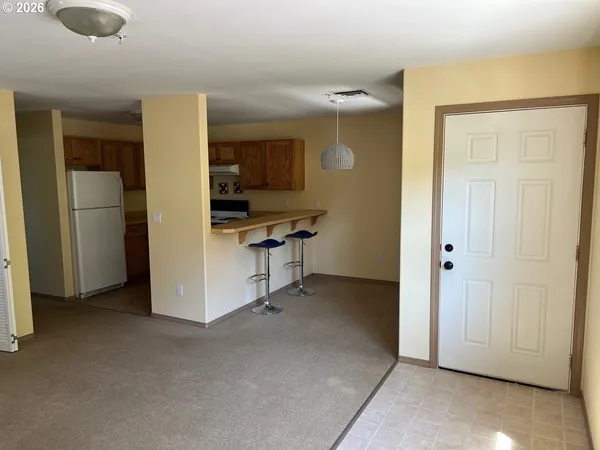 a view of a kitchen with a sink