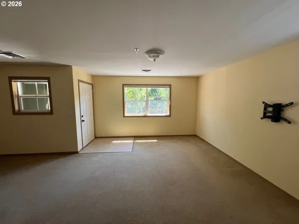 an empty room with windows