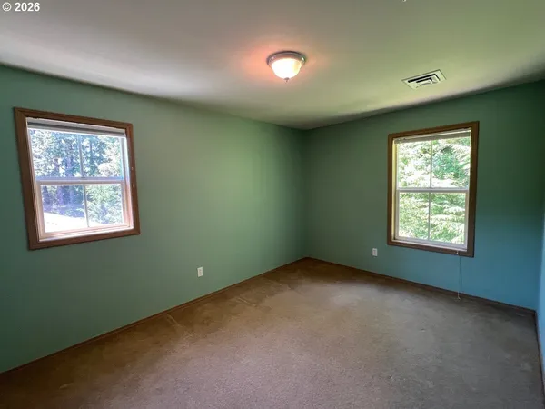 an empty room with a window