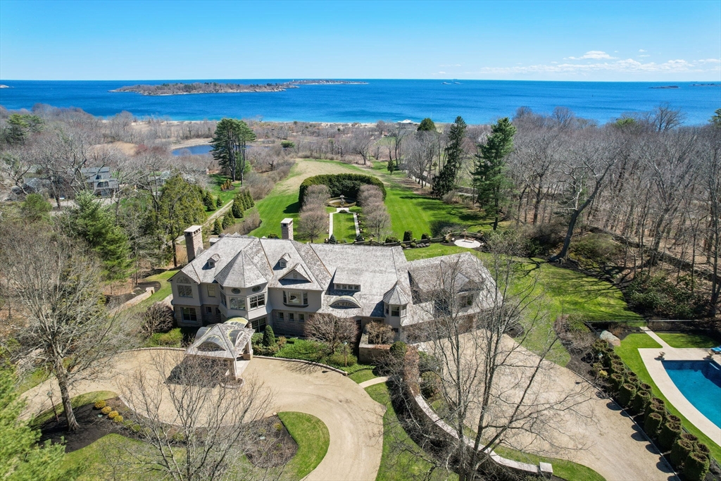 an aerial view of a house with outdoor space