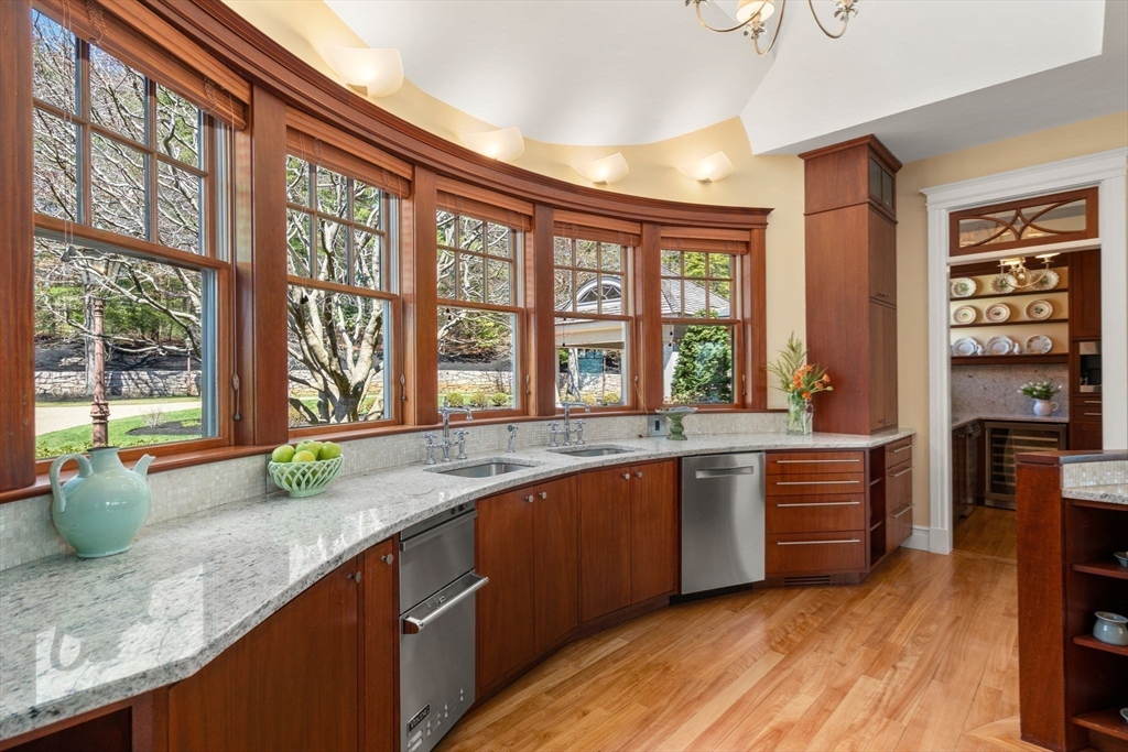 53 Paine Avenue Beverly, MA 01915 - Photo 12 of 40 a large kitchen with granite countertop a large window and a sink