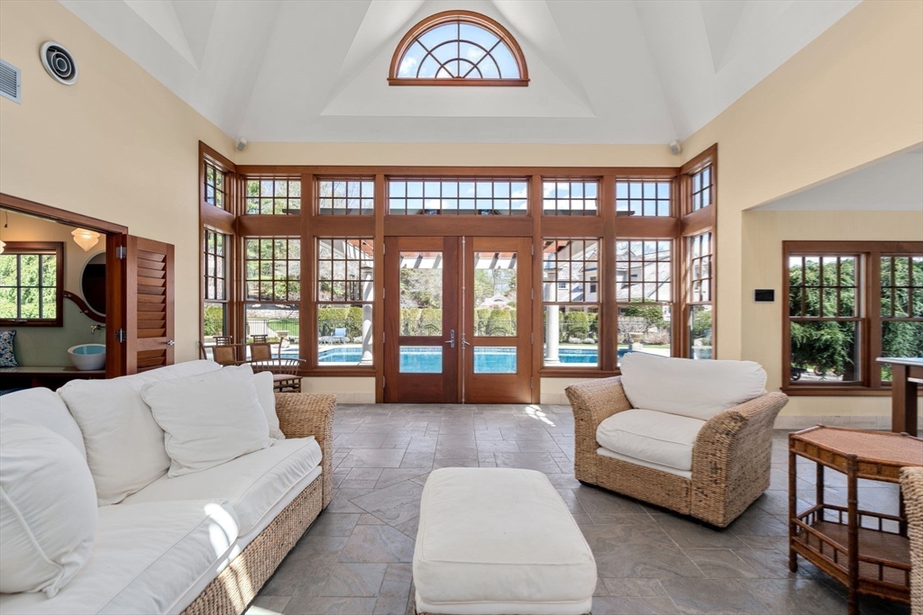 53 Paine Avenue Beverly, MA 01915 - Photo 30 of 40 a living room with furniture and a large window