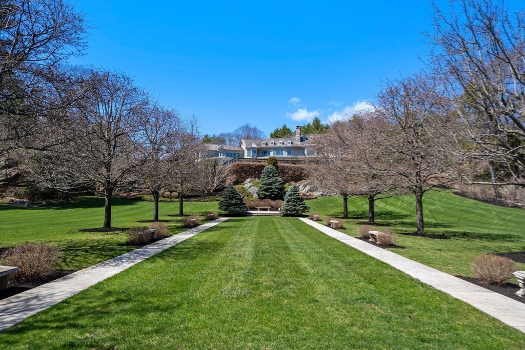 53 Paine Avenue Beverly, MA 01915 - Photo 38 of 40 a view of a lake with a yard and a large tree