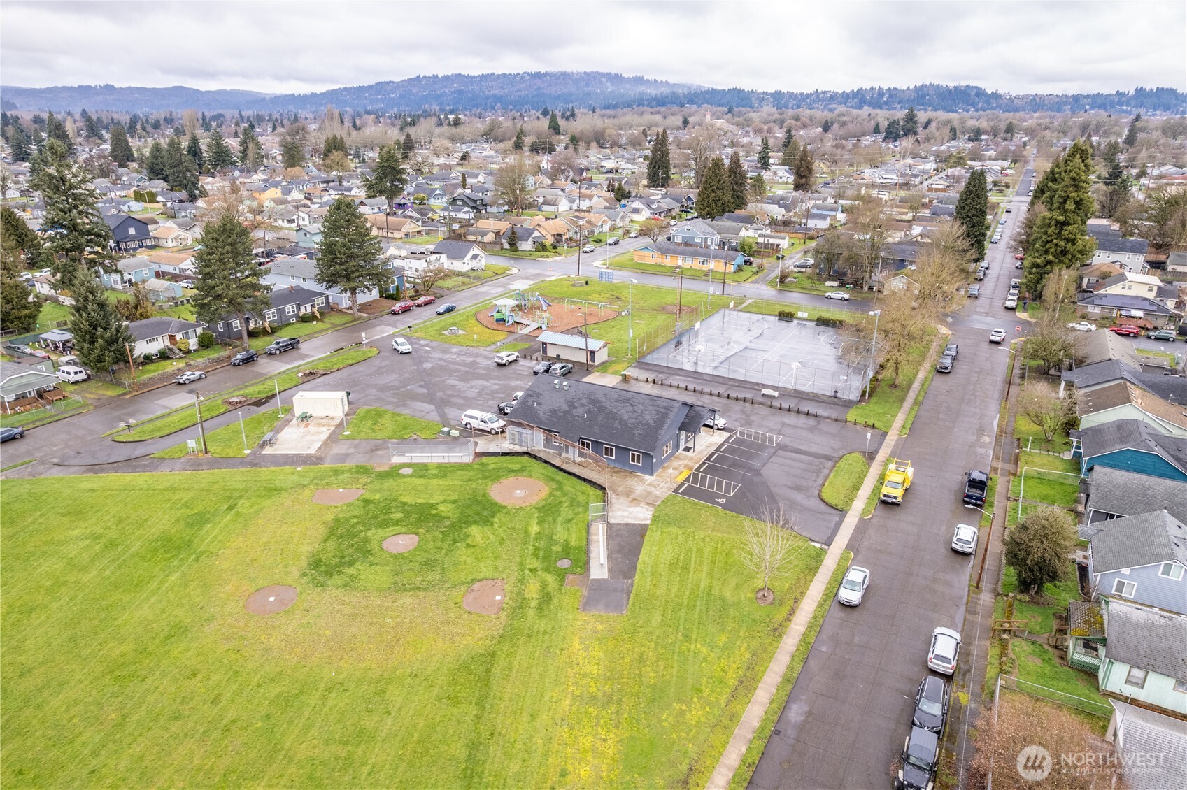 288 21st Avenue Longview, WA 98632 - Photo 22 of 22 an aerial view of residential houses with outdoor space and swimming pool