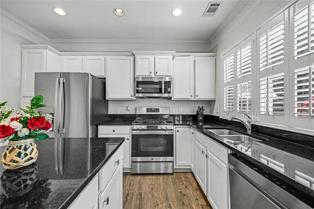 705 Berkeley Terrace Canton, GA 30115 - Photo 7 of 34