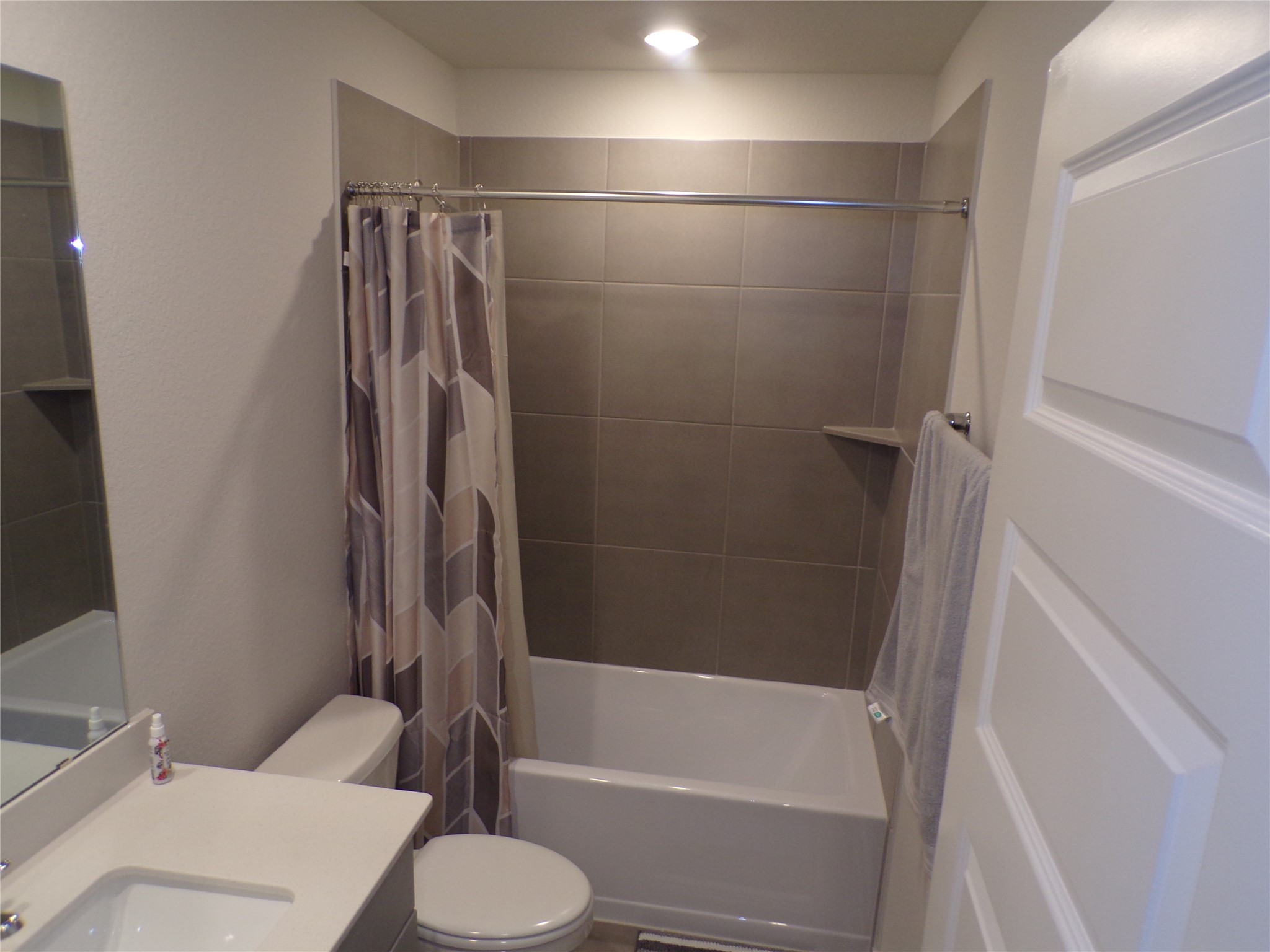 15419 Dapple Blf Lane Conroe, TX 77302 - Photo 15 of 19 a bathroom with a toilet and a shower