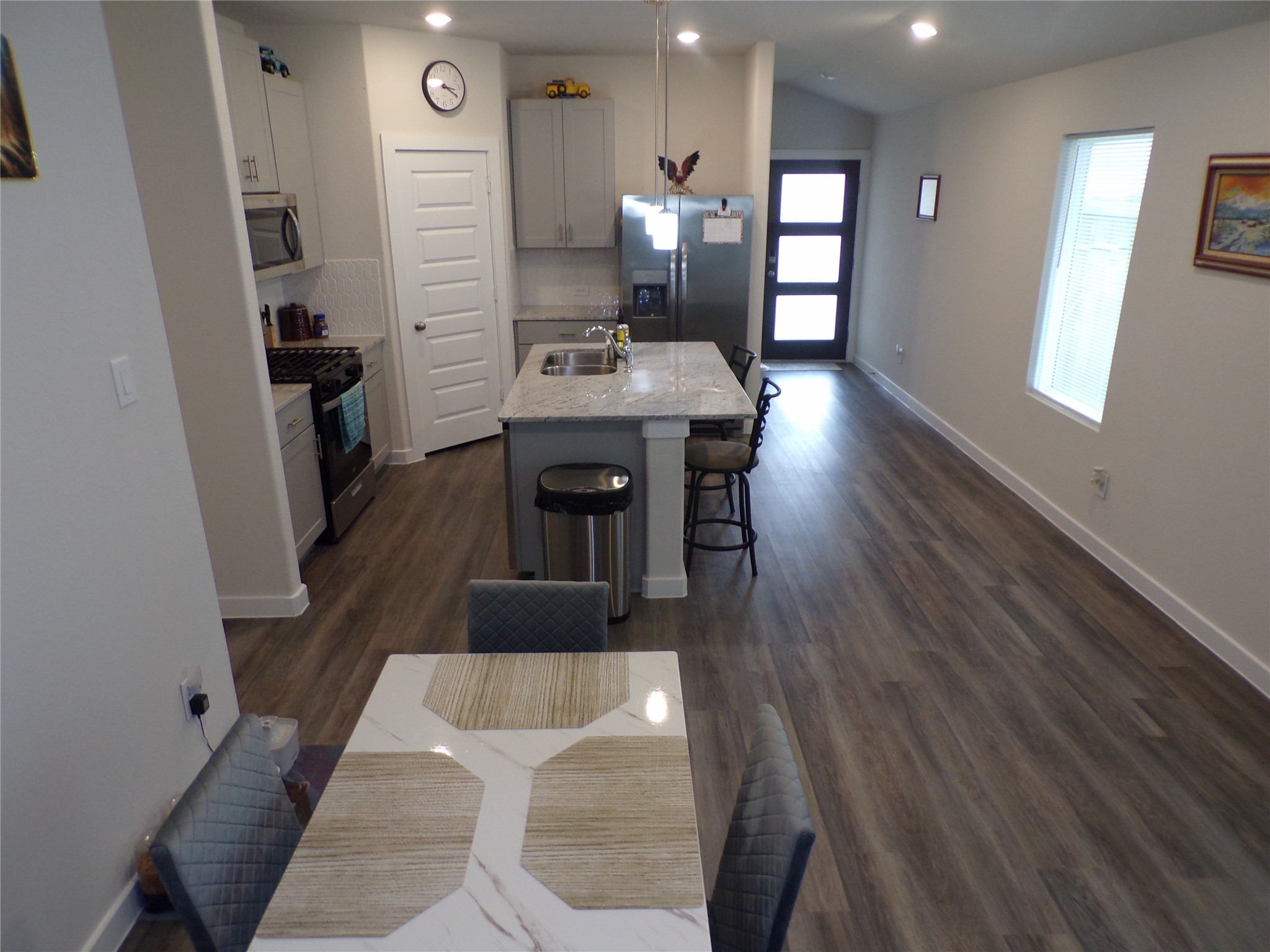 15419 Dapple Blf Lane Conroe, TX 77302 - Photo 4 of 19 a living room with furniture and wooden floor