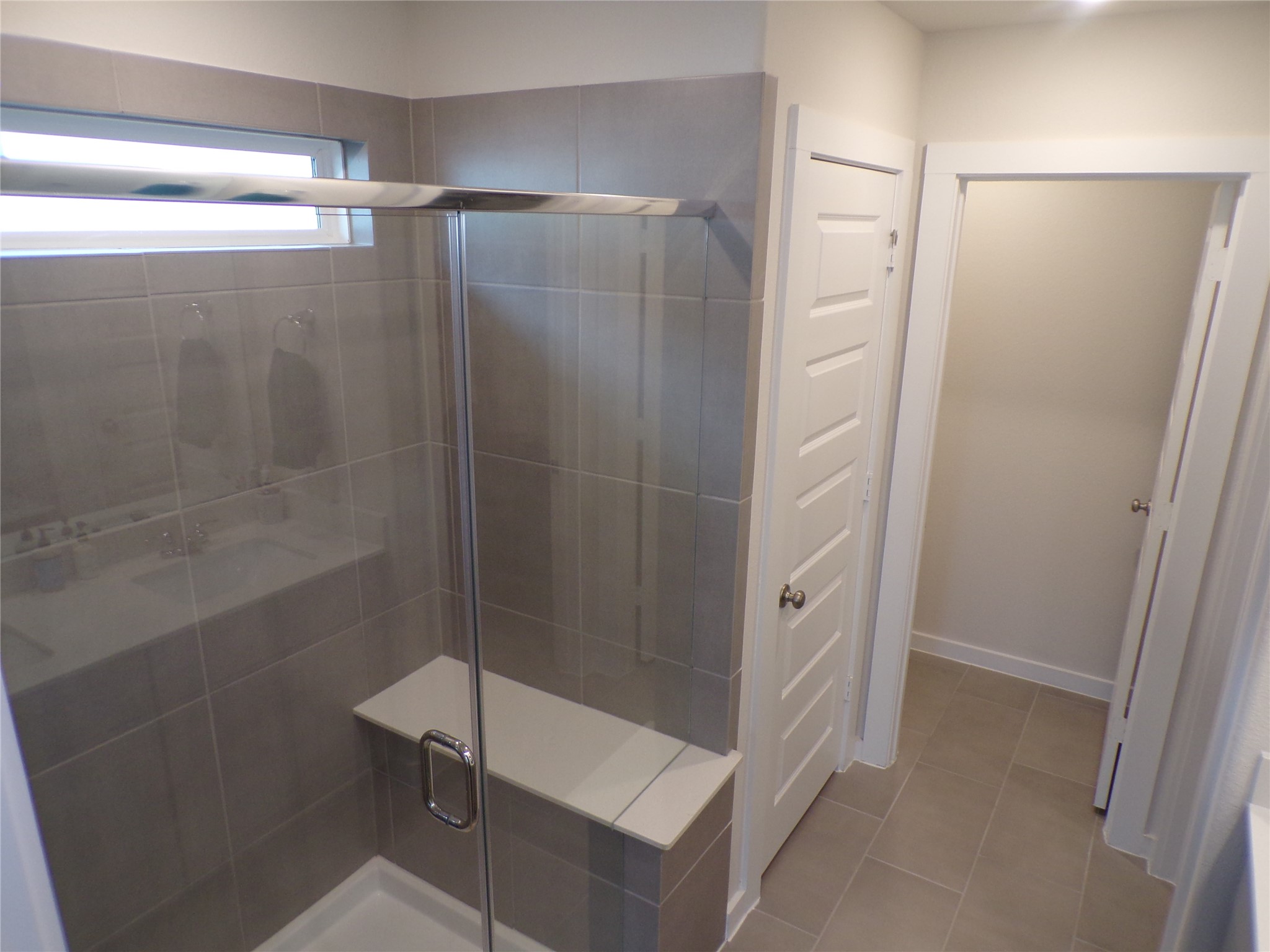 15419 Dapple Blf Lane Conroe, TX 77302 - Photo 7 of 19 a bathroom with a shower and a sink