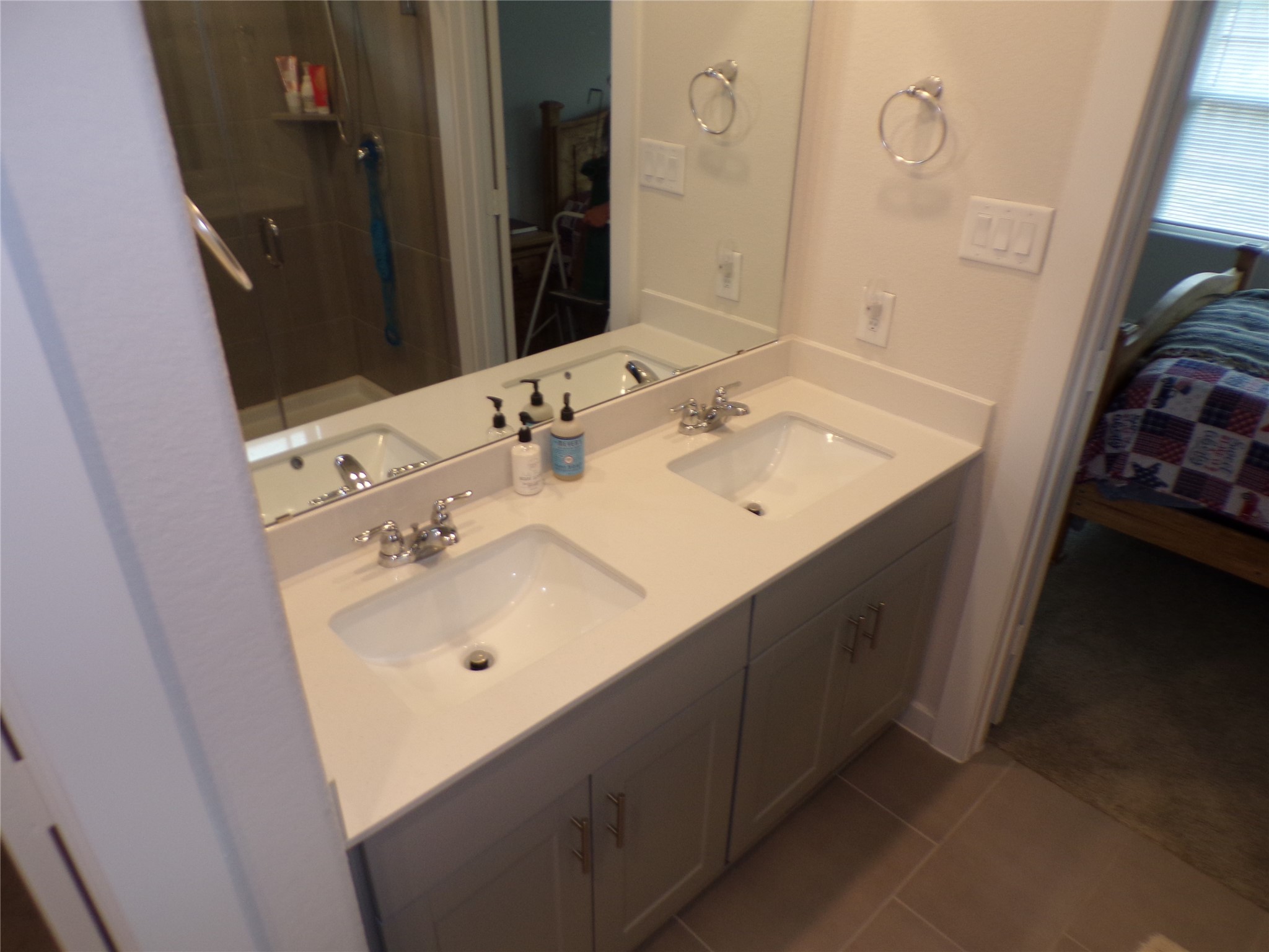 15419 Dapple Blf Lane Conroe, TX 77302 - Photo 9 of 19 a bathroom with a sink vanity and mirror