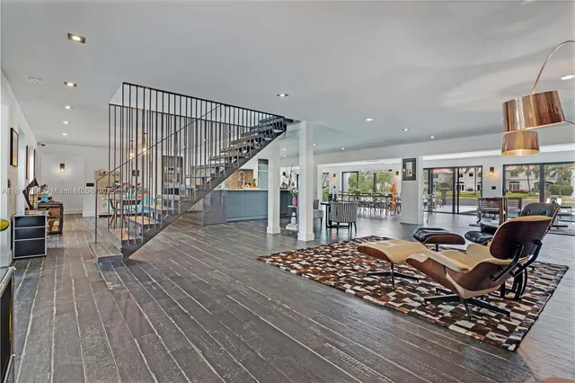 a view of a swimming pool with an outdoor seating