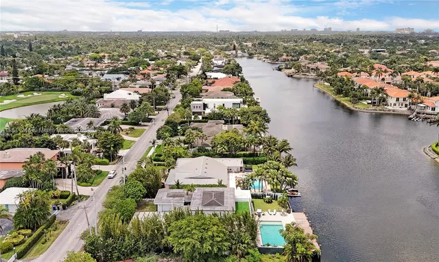 a balcony with table and chairs