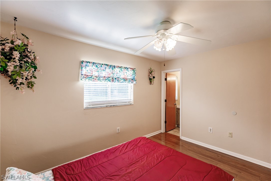18506 Geranium Road Fort Myers, FL 33967 - Photo 15 of 32 a view of empty room with window and ceiling fan