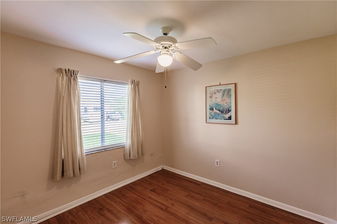 18506 Geranium Road Fort Myers, FL 33967 - Photo 18 of 32 wooden floor in an empty room with a window