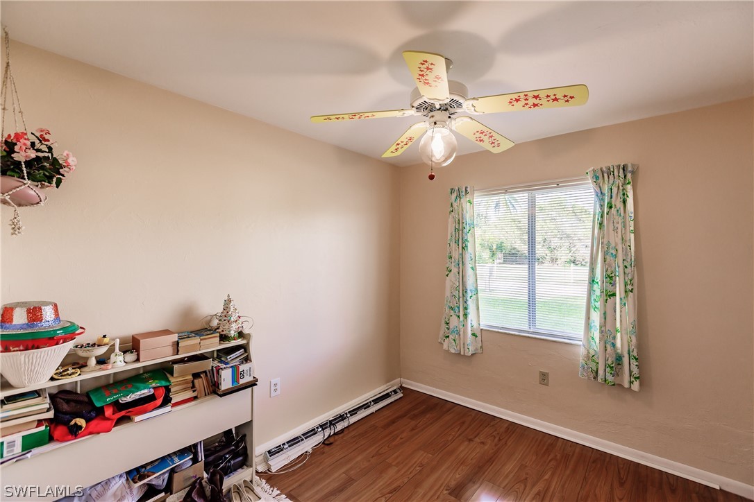 18506 Geranium Road Fort Myers, FL 33967 - Photo 20 of 32 a view of a workspace with furniture and a window
