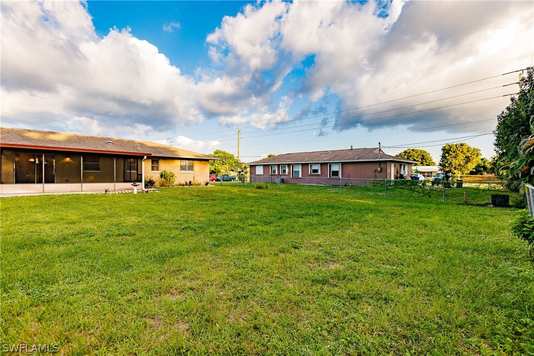18506 Geranium Road Fort Myers, FL 33967 - Photo 28 of 32 a view of a house with a big yard