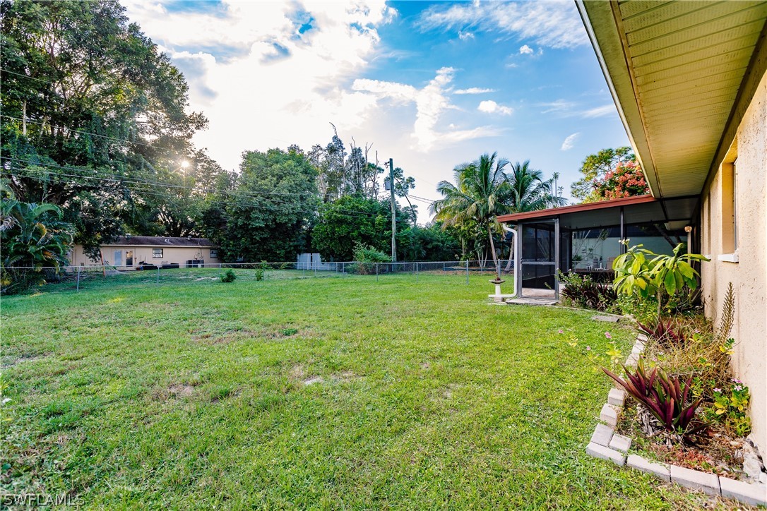 18506 Geranium Road Fort Myers, FL 33967 - Photo 29 of 32 a view of a house with a backyard