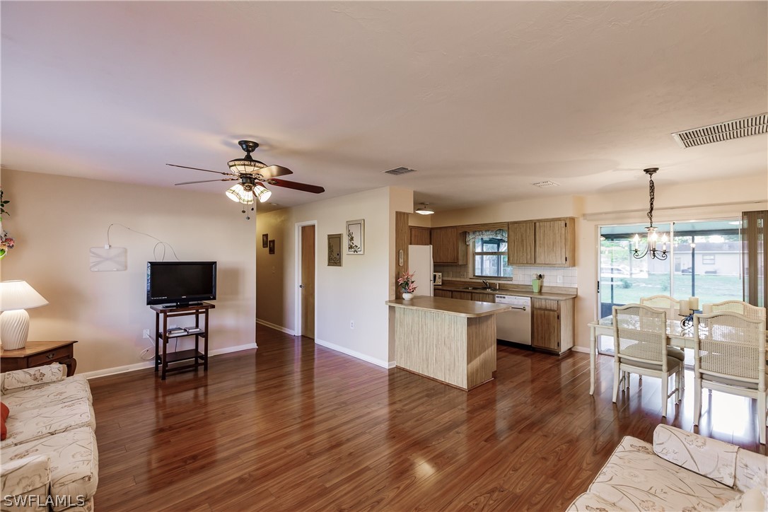 18506 Geranium Road Fort Myers, FL 33967 - Photo 7 of 32 a living room with furniture and a wooden floor