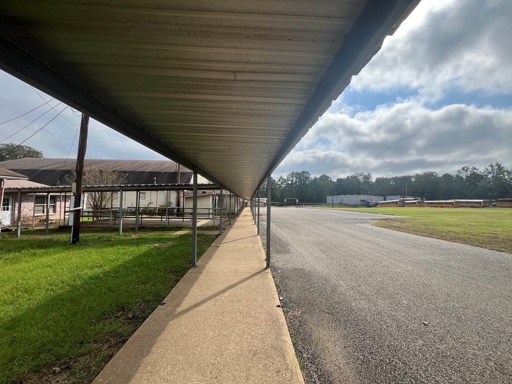 215 Buchanan Street Broaddus, TX 75929 - Photo 7 of 30 a view of a swimming pool with a yard