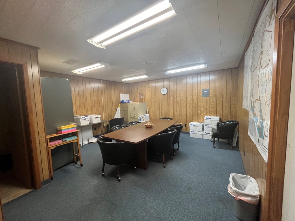 215 Buchanan Street Broaddus, TX 75929 - Photo 10 of 30 a living room with furniture a rug and a window