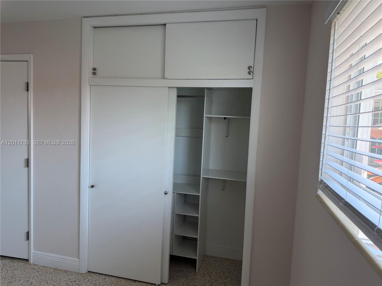 3311 Southwest 25th Terrace, Unit 3315 Miami, FL 33133 - Photo 7 of 10 a view of an empty walk in closet