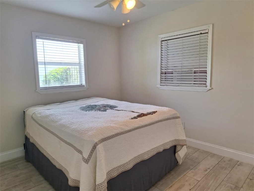 9150 44th Avenue, Unit 15 Sebastian, FL 32958 - Photo 11 of 21 a bedroom with a bed and a window