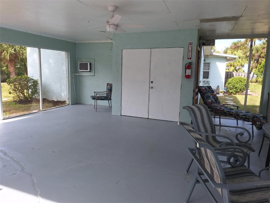 9150 44th Avenue, Unit 15 Sebastian, FL 32958 - Photo 19 of 21 a view of a livingroom with furniture window and outside view