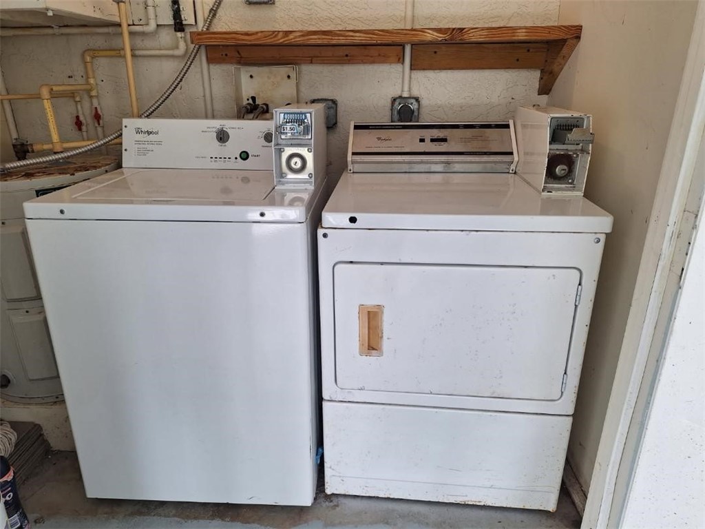 9150 44th Avenue, Unit 15 Sebastian, FL 32958 - Photo 21 of 21 a utility room with dryer and washer