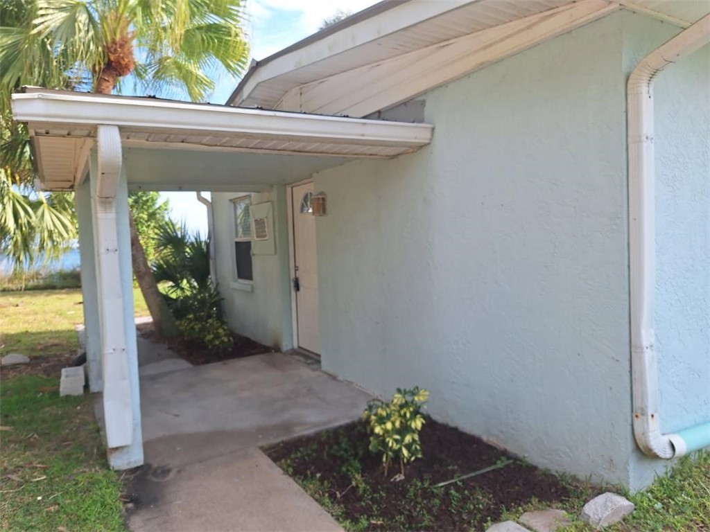 9150 44th Avenue, Unit 15 Sebastian, FL 32958 - Photo 4 of 21 a view of a porch with furniture