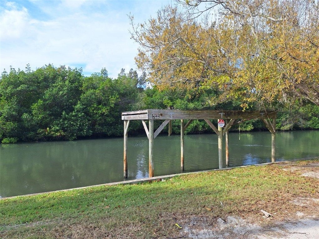 9150 44th Avenue, Unit 15 Sebastian, FL 32958 - Photo 7 of 21 a view of a lake